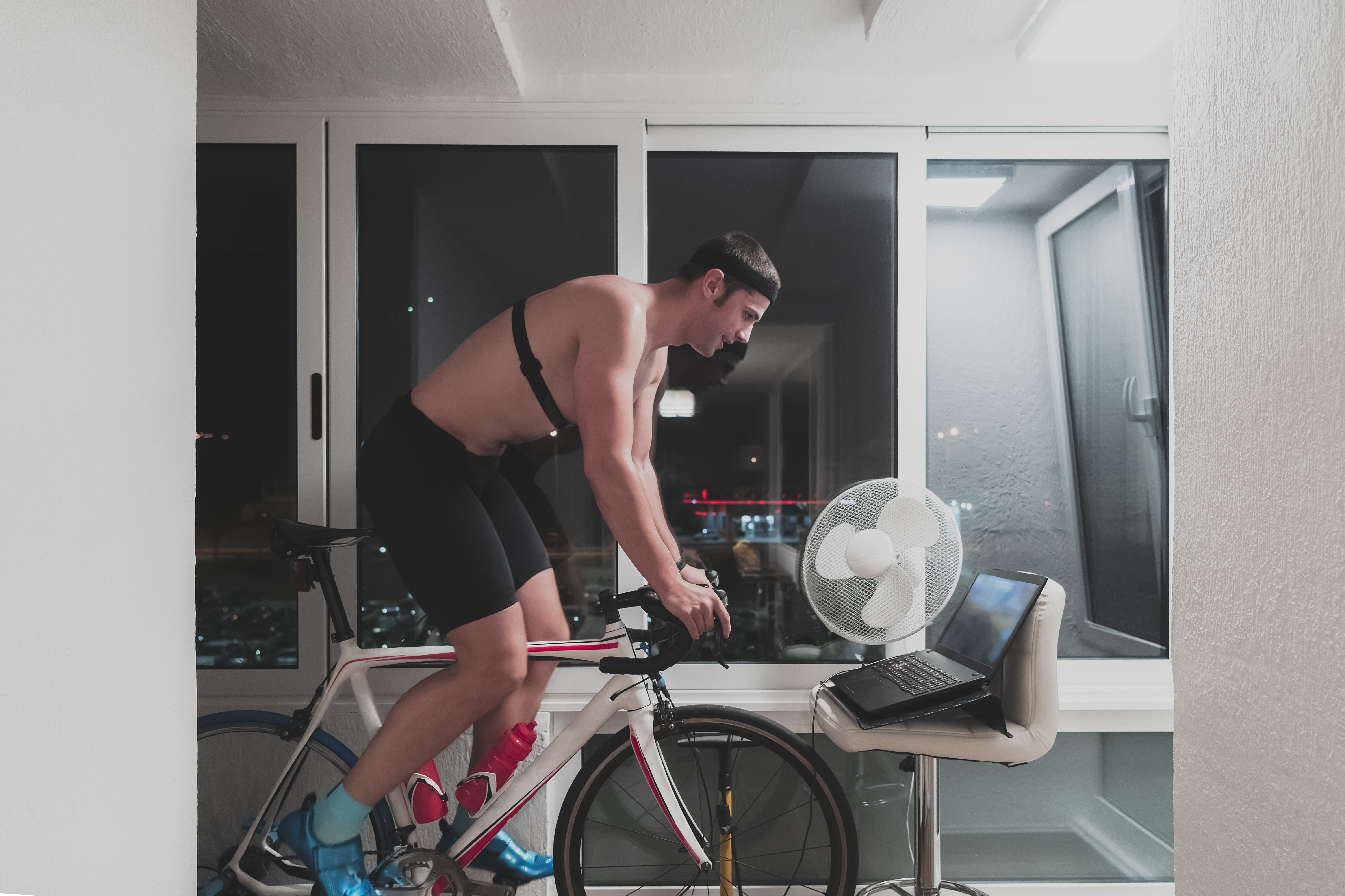Cyclist riding hard on a smart trainer